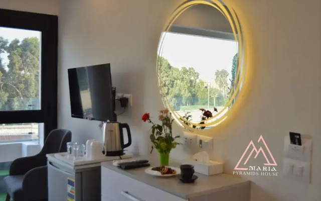 Maria Pyramids House