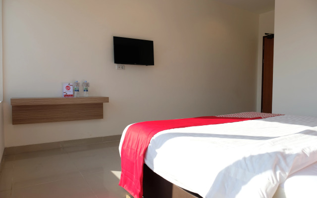 Purple Hotel by OYO Rooms