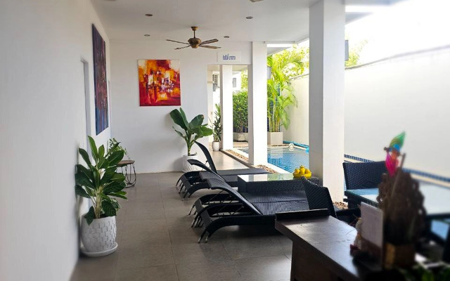 One World One Home Naiharn Hotel