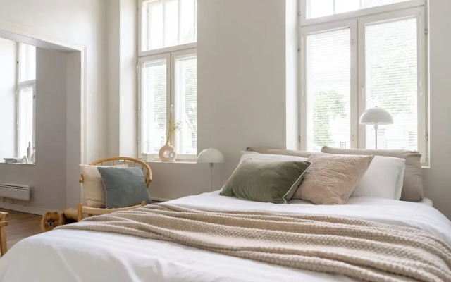 A bright wooden studio for four