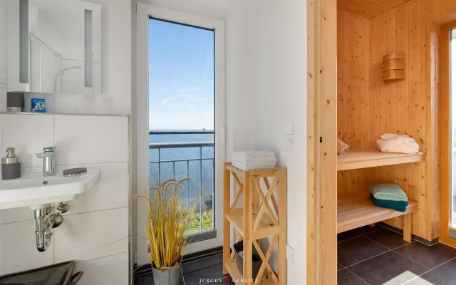 Ostseewind: Wasserblick, finnische Sauna, Whirlwanne, Kamin, 2 Parkplaetze