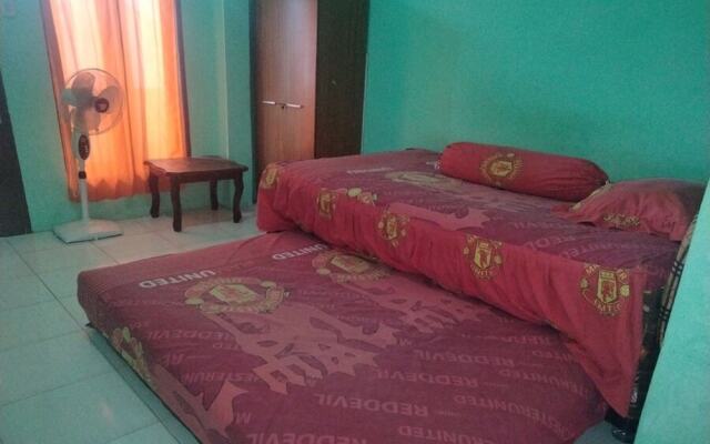 SPOT ON 92839 Nany Asoka Syariah Near Anyong Cafe Studio