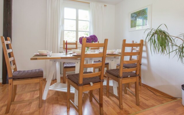 A Lovely Watermill Surrounded by Delightful Greenery