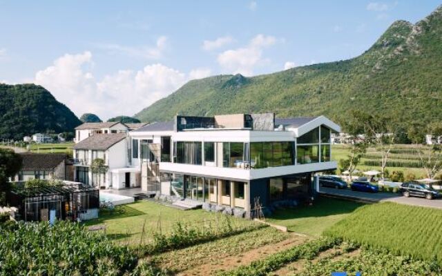 Xingyi Wanfeng Linyi Boutique Inn (Wanfenglin Baguatian Attractions)