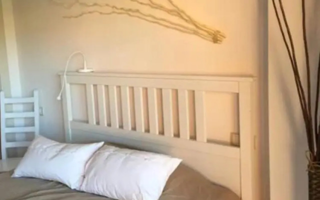 Precioso apartamento con jardín y piscina comunitaria