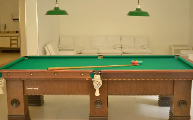 150m da praia com piscina aquecida e sauna