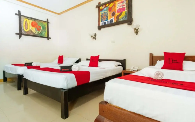 Reddoorz Premium Near Pristine Beach