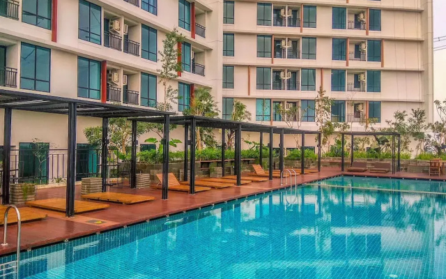 Simple White Designed Studio At Lrt City Bekasi Apartment