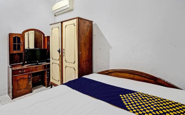 SPOT ON 92595 Umi Homestay Syariah