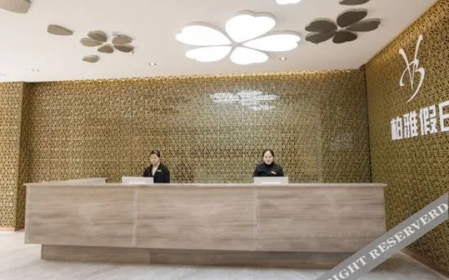 Baiya Light Luxury Holiday Apartment (Yangzhou Railway Station Jinghuacheng Branch)