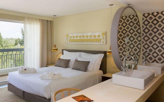 Ozadi Tavira Hotel