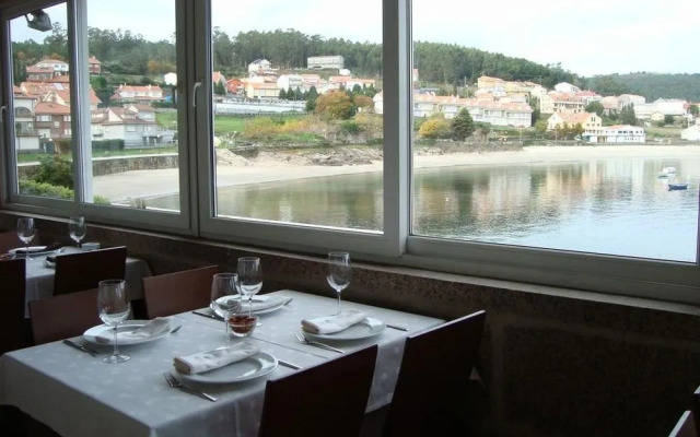 Hotel Playa de Quenxe