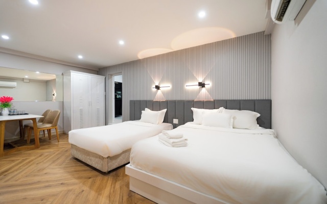 Golden Suites Saigon – Guest Rooms – Ho Chi Minh City