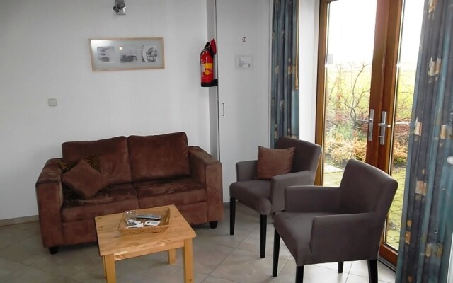 Detached Bungalow with Stove Located in the Betuwe
