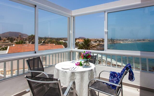 Coral Bay Beachfront Apartment by Vacanzy Collection
