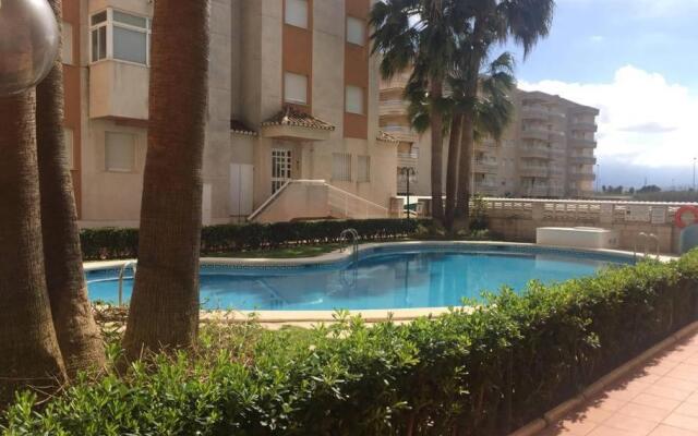 .Apartamento 1a linea de playa + piscina + parking DAIMUS