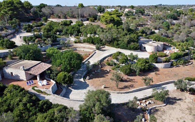 Villa Agapanto - Trullo Anthos con Vista Mare e Giardino Privato
