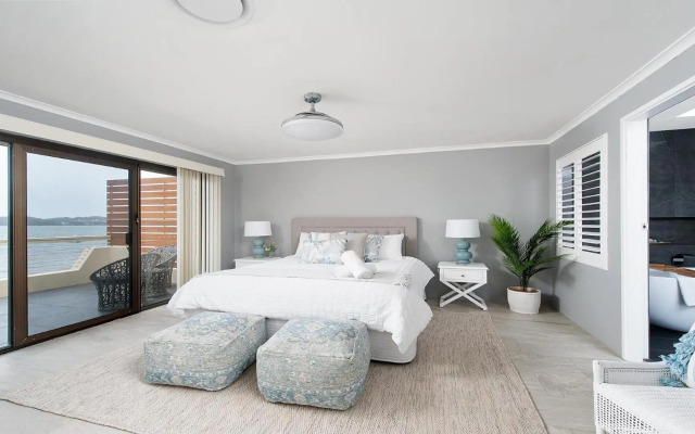 Seaside Sanctuary - Waterfront Luxury Home with Heated Pool