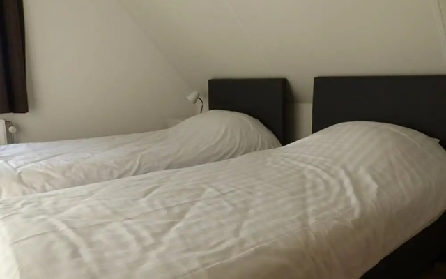 Spacious 10-person Villa in Quiet Holiday Park