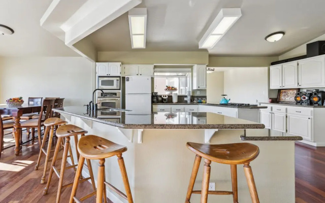 Elegant Escape 4 Bedroom Home by RedAwning