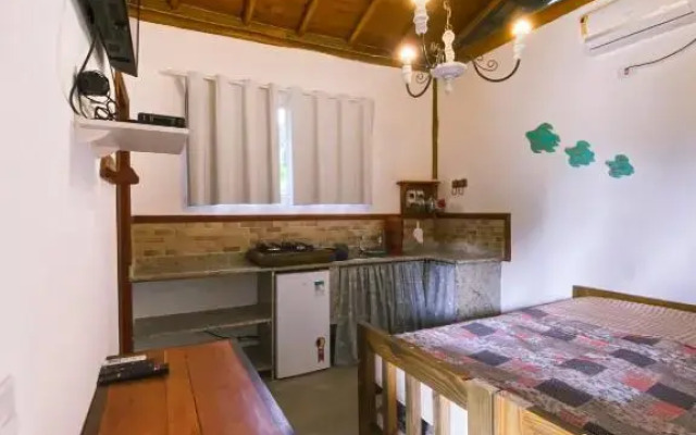 Suíte com cozinha próxima a Trindade Paraty Flats Roots