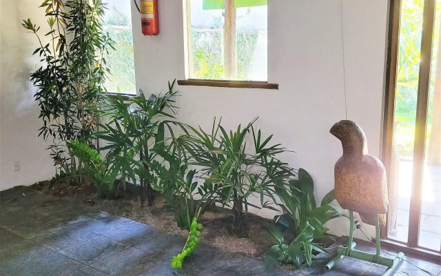 Linda casa com piscina a poucos passos da praia