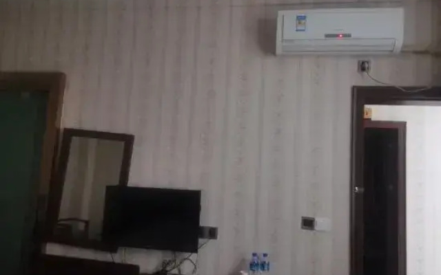 Guangnan Xinshengdu Business Hotel