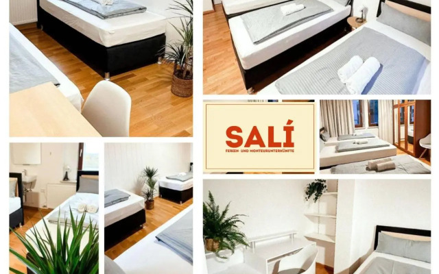 Suiteable Living - Boardinghaus mit Parkplätzen, WLAN und Waschraum