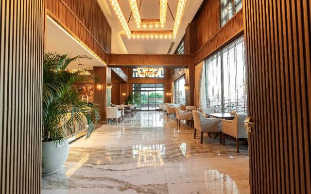 By The Marina Hotel