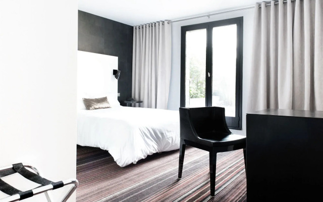 L'Hôtel - Face au Château - Boutique Hôtel et Séminaires