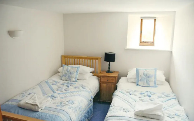 A spacious barn conversion with charming features near Looe