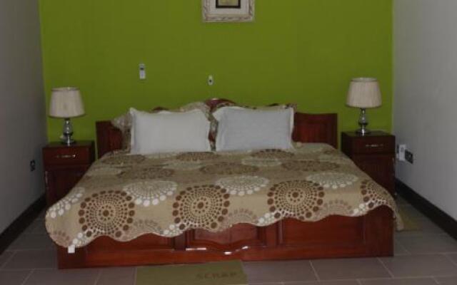 Oguaa Apartments & Lodging