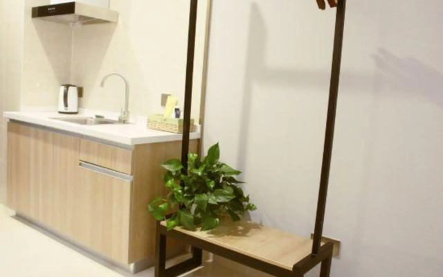 Qing shi guang apartment(greenland Central Plaza store)