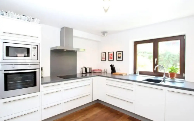 Quaint Chalet in Kirchberg with Terrace, Garden, Ski Storage