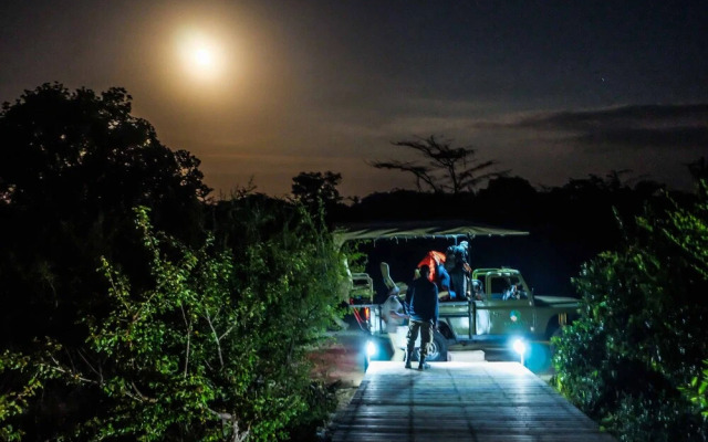 Saadani Safari Lodge - bush, river, beach