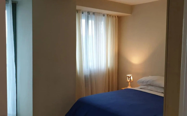 MANDALUYONG 2 Br w 2 Queen, 50HDtv across Shangrila Mall