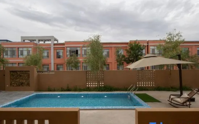 Dunhuang Minglu Designer Guesthouse – Pool – Jiuquan