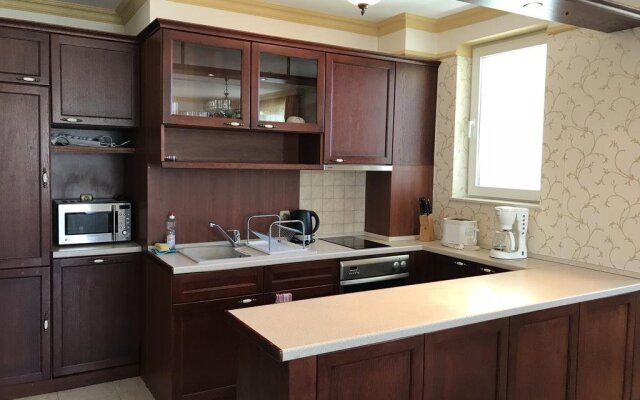 Gold Corp Apartments