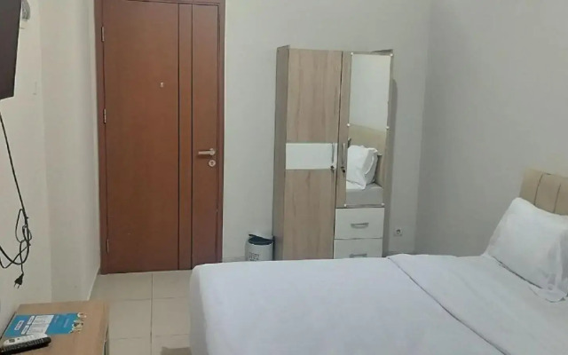 RedDoorz Apartemen @ Green Lake View Cimanggis