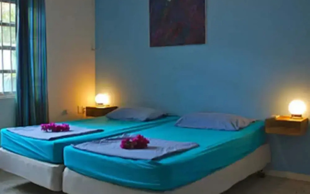 Caribbean Flower Apartments
