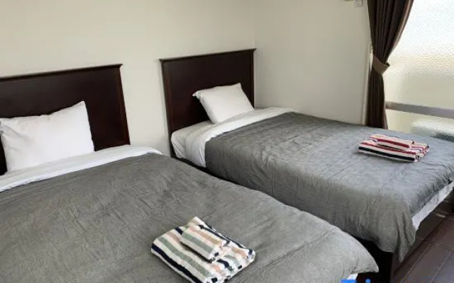 Condominium Hotel Likka in Gusukuma — 2-star hotel in Urasoe