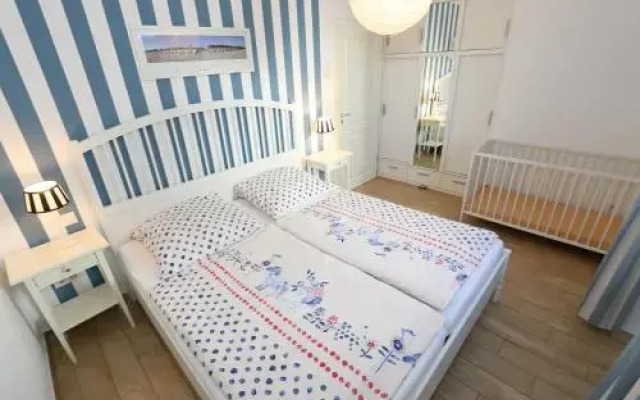 Kurparkresidenz Baabe - Ferienwohnung Meeresgarten mit Terrasse