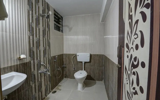 SPOT ON 37153 Karavali Paradise