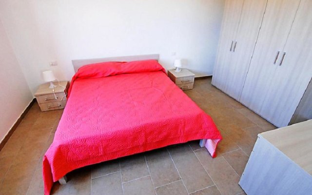 2 bedrooms house with enclosed garden and wifi at Sant'Anna Arresi 3 km away from the beach