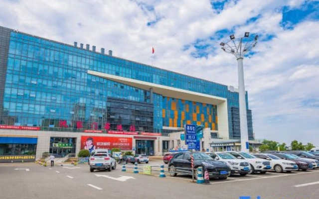 Lezhou Business Hotel (Zhoushan Shenjiamen Passenger Station)