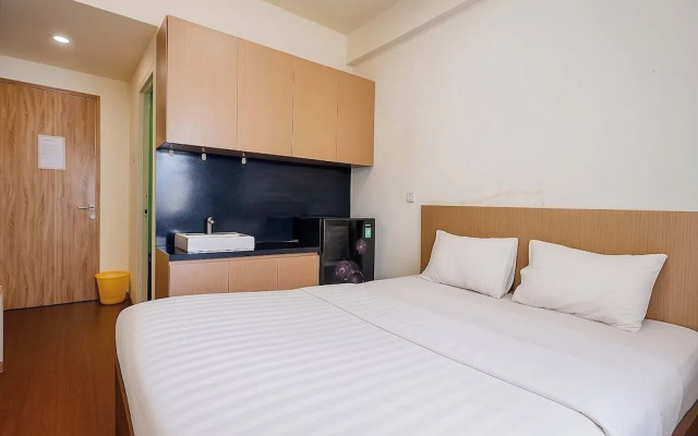 Quintessa Room at Candiland Apartement