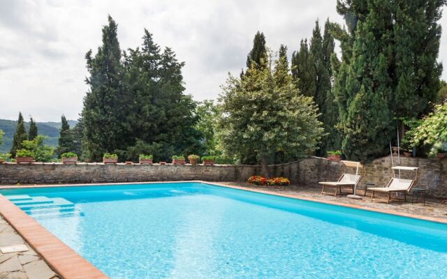 House on the Property Next to an Ancient Villa With a View of the Hills and Pool