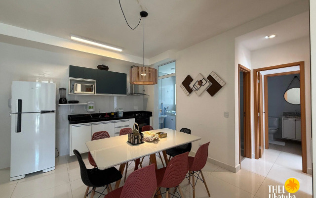 Apto completo e confortável com roupa de cama nas Toninhas  Condomínio Lumière