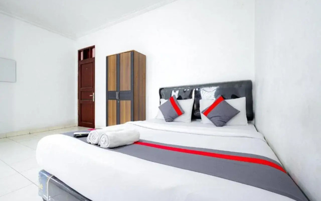 Super OYO 91535 J&b Rooms Tomang