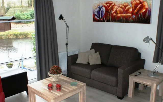 Modern chalet with two terraces and near a pond